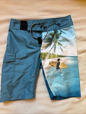 Molo Teal and Aqua Boys' Surf Scene Swim Trunks